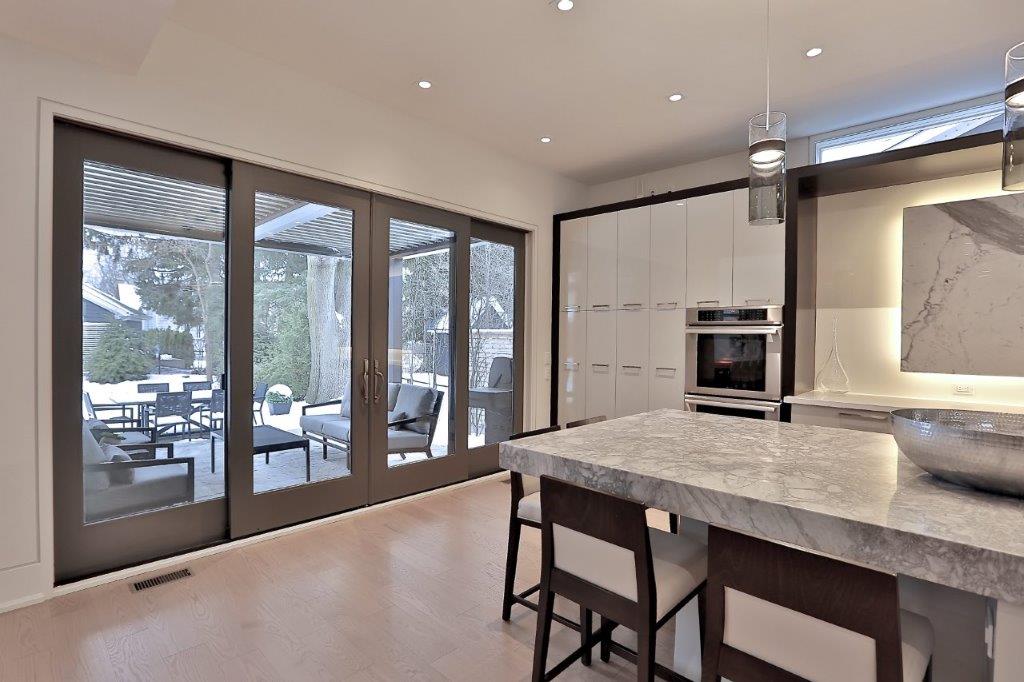 Looking out patio doors from kitchen