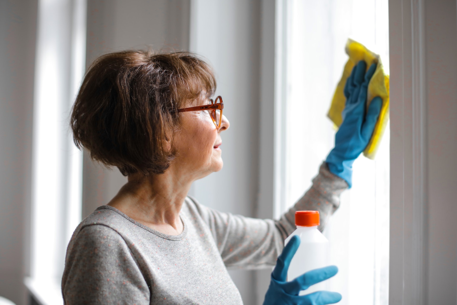 Woman Cleaning Windows